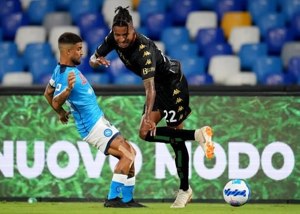 Lorenzo Insigne of SSC Napoli competes for the ball with Tyronne Ebuehi of Venezia FC ,during the Serie A match between SSC Napoli v Venezia FC at...