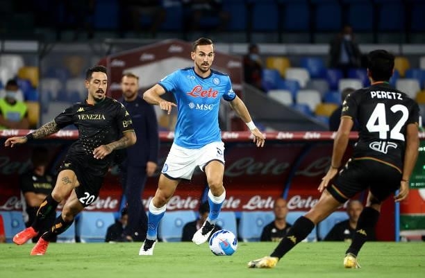 Fabian Ruiz of SSC Napoli competes for the ball with Francesco Di Mariano and Dor Peretz of Venezia FC ,during the Serie A match between SSC Napoli v...