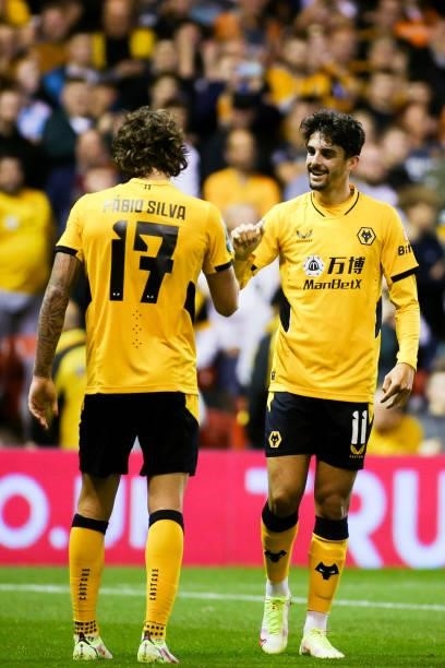 Francisco Trincao of Wolverhampton Wanderers celebrates scoring his team's third goal with Fabio Silva during the Carabao Cup Second Round match...