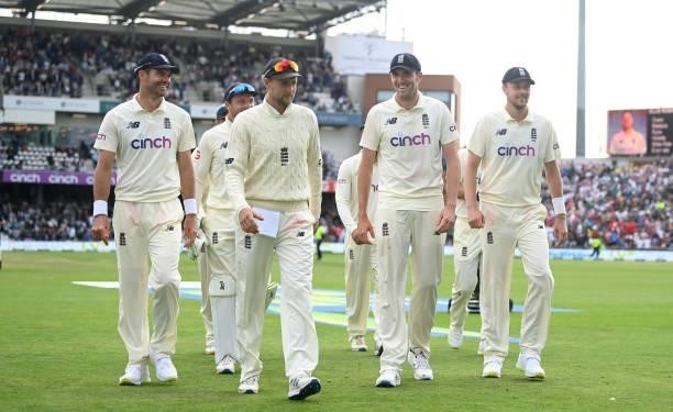 England captain Joe Root alongside bowlers James Anderson, Craig Overton and Ollie Robinson as they leave the field after India's first innings...