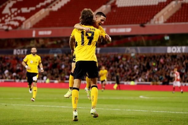Daniel Podence of Wolverhampton Wanderers celebrates with Fabio Silva after scoring his team's second goal during the Carabao Cup Second Round match...