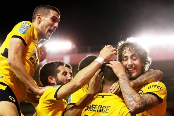 Daniel Podence of Wolverhampton Wanderers celebrates with his teammates after scoring their sides second goal during the Carabao Cup Second Round...