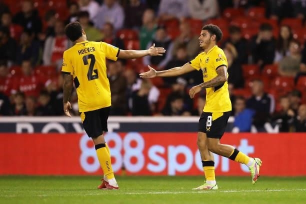 Morgan Gibbs-White of Wolverhampton Wanderers celebrates scoring his team's fourth goal with Ki-Jana Hoever during the Carabao Cup Second Round match...