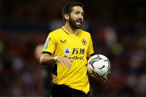 Joao Moutinho of Wolverhampton Wanderers prepares to take a corner during the Carabao Cup Second Round match between Nottingham Forest and...