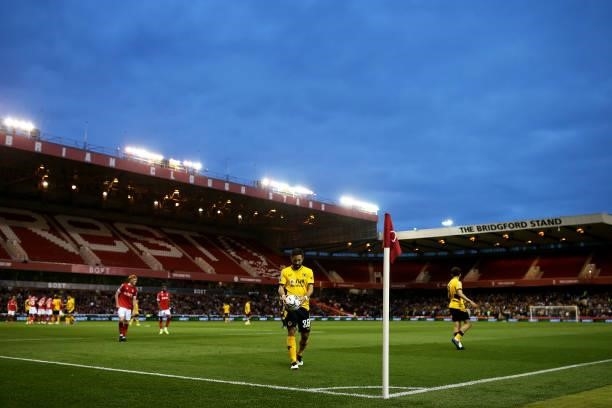 Joao Moutinho of Wolverhampton Wanderers prepares to take a corner during the Carabao Cup Second Round match between Nottingham Forest and...