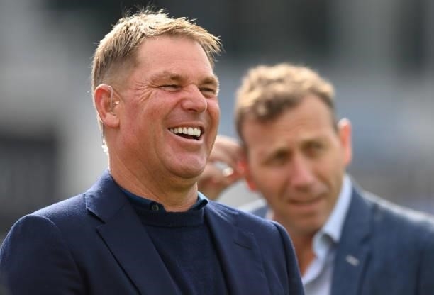 Shane Warne of Sky television laughs with Michael Atherton in the background before the 3rd LV= Test Match between England and India at Emerald...