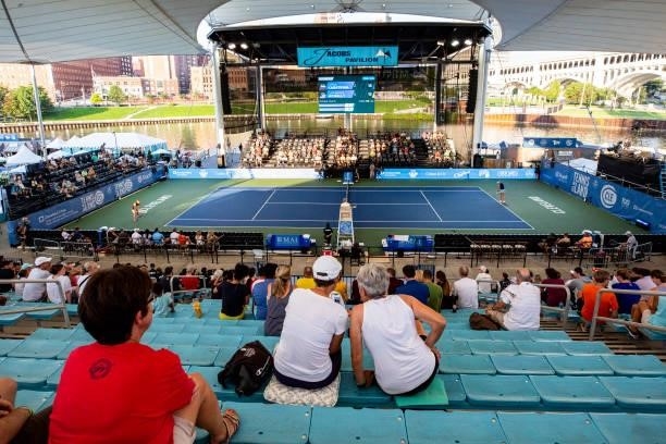 Fans watch Catherine McNally of USA and Daria Kasatkina of Russia compete on day 3 of the Cleveland Championships at Jacobs Pavilion on August 24,...