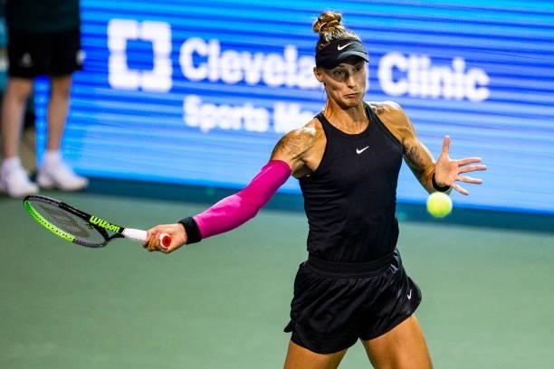 Polona Hercog of Slovenia returns the ball to Irina-Camelia Begu of Romania during the first set of their match on day 3 of the Cleveland...