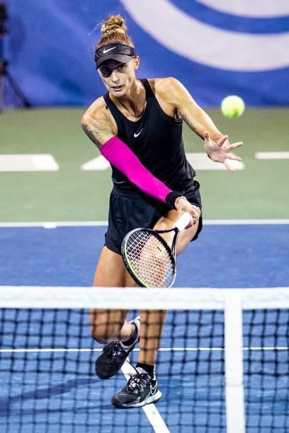 Polona Hercog of Slovenia volleys the ball to Irina-Camelia Begu of Romania during the second set of their match on day 3 of the Cleveland...