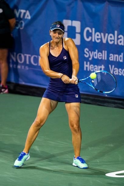 Irina-Camelia Begu of Romania returns a serve to Polona Hercog of Slovenia during the first set of their match on day 3 of the Cleveland...