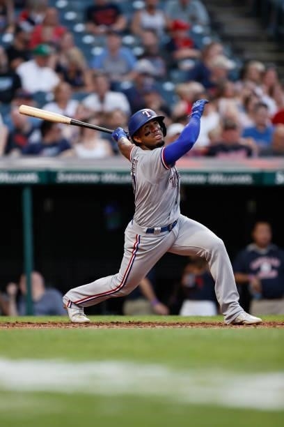 Andy Ibáñez of the Texas Rangers bats against the Cleveland Indians during the third inning at Progressive Field on August 24, 2021 in Cleveland,...