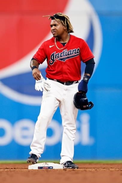 Jose Ramirez of the Cleveland Indians waits on second base during a pitching change in the sixth inning at Progressive Field on August 24, 2021 in...