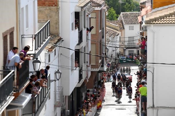 General view of the Peloton passing through Valdepeñas de Jaén Village while fans cheer during the 76th Tour of Spain 2021, Stage 11 a 133,6km stage...