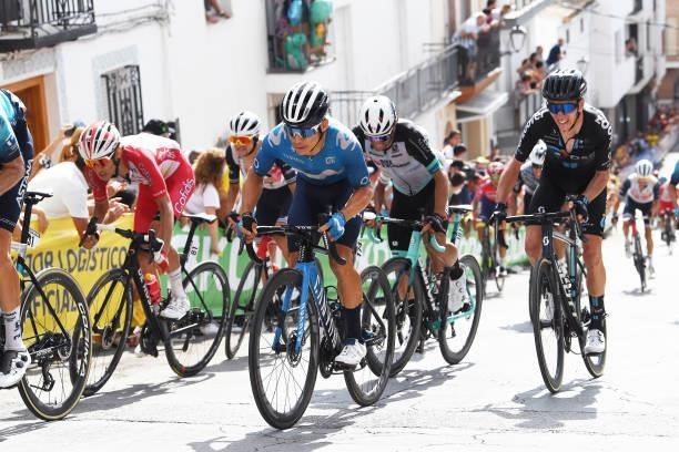 Miguel Ángel López Moreno of Colombia and Movistar Team and Romain Bardet of France and Team DSM passing through Valdepeñas de Jaén Village while...