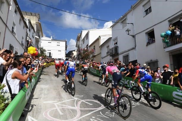 Diego Andres Camargo Pineda of Colombia and Team EF Education - Nippo and The Peloton passing through Valdepeñas de Jaén Village while fans cheer...