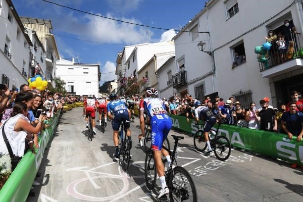 Anthony Roux of France and Team Groupama - FDJ and The Peloton passing through Valdepeñas de Jaén Village while fans cheer during the 76th Tour of...