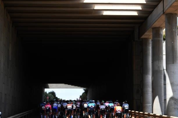 General view of the peloton in shadow passing through a tunnel during the 76th Tour of Spain 2021, Stage 11 a 133,6km stage from Antequera to...