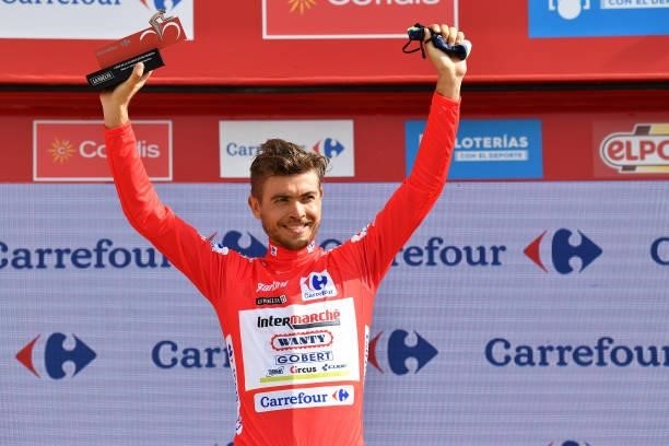Odd Christian Eiking of Norway and Team Intermarché - Wanty - Gobert Matériaux celebrates winning the Red Leader Jersey on the podium ceremony after...
