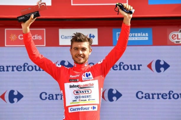 Odd Christian Eiking of Norway and Team Intermarché - Wanty - Gobert Matériaux celebrates winning the Red Leader Jersey on the podium ceremony after...