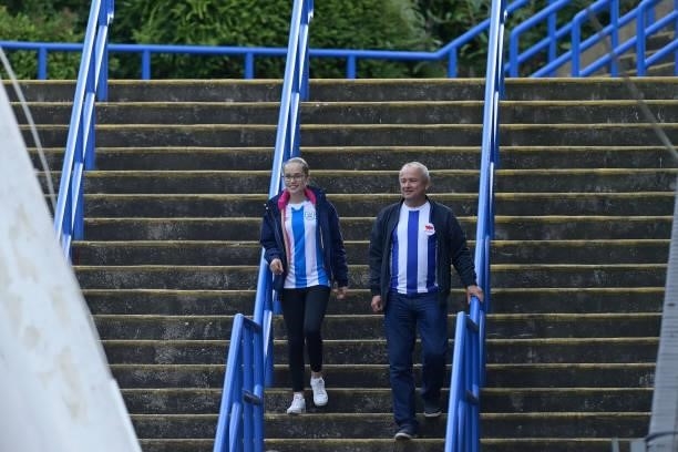 Huddersfield Town fans arrive for the Carabao Cup Second Round match between Huddersfield Town and Everton at John Smiths Stadium on August 24 2021...