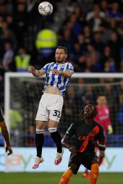 Tom Lees of Huddersfield Town heads clear during the game between Huddersfield Town and Everton in the second round of the Carabao Cup on August 24,...