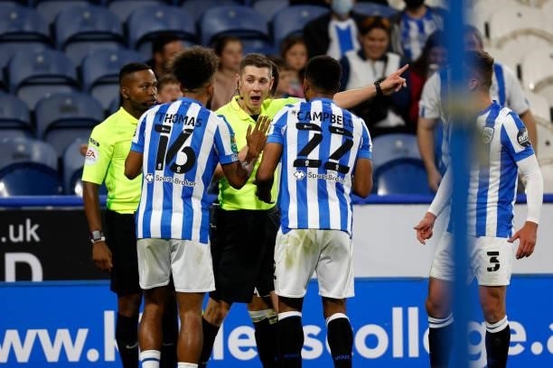 Referee Matt Donohue explains why he has disallowed a goal to Huddersfield Town during the game between Huddersfield Town and Everton in the second...