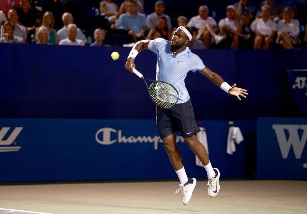 Frances Tiafoe returns a shot to Thiago Monteiro of Brazil on Day 5 of the Winston-Salem Open at Wake Forest Tennis Complex on August 25, 2021 in...