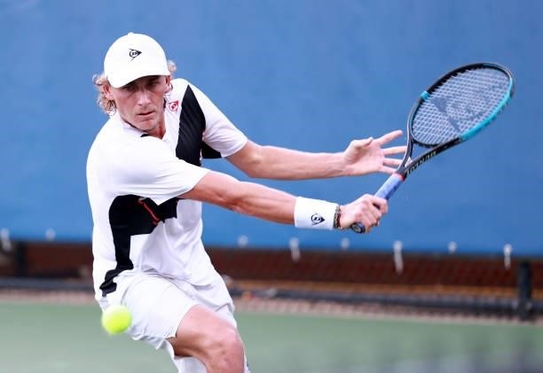 Max Purcell of Australia retuns a shot to Mikael Ymer of Sweden on Day 5 of the Winston-Salem Open at Wake Forest Tennis Complex on August 25, 2021...