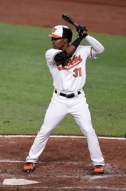 Cedric Mullins of the Baltimore Orioles bats against the Los Angeles Angels at Oriole Park at Camden Yards on August 24, 2021 in Baltimore, Maryland.