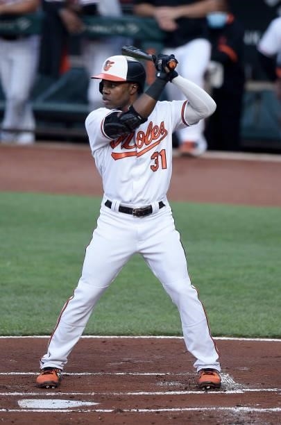 Cedric Mullins of the Baltimore Orioles bats against the Los Angeles Angels at Oriole Park at Camden Yards on August 24, 2021 in Baltimore, Maryland.