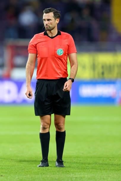 Referee Patrick Kesseö reacts during the 3. Liga match between VfL Osnabrück and Borussia Dortmund II at Stadion an der Bremer Brücke on August 25,...