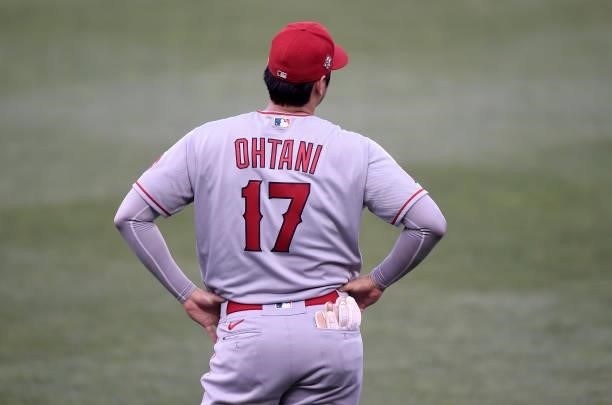 Shohei Ohtani of the Los Angeles Angels warms up before the game against the Baltimore Orioles at Oriole Park at Camden Yards on August 24, 2021 in...