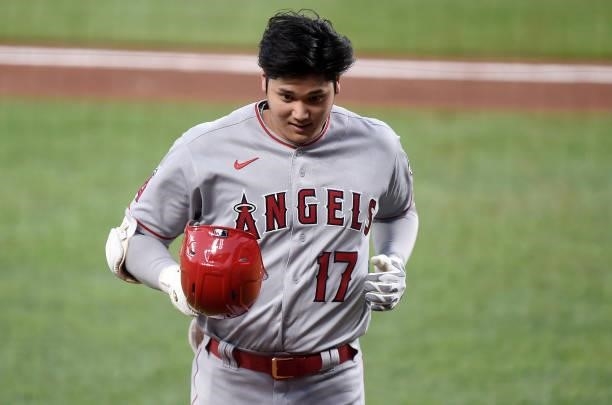 Shohei Ohtani of the Los Angeles Angels runs to the dugout in the second inning against the Baltimore Orioles at Oriole Park at Camden Yards on...