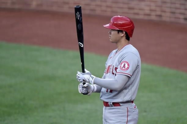 Shohei Ohtani of the Los Angeles Angels gets ready to bat before the start of the first inning against the Baltimore Orioles at Oriole Park at Camden...