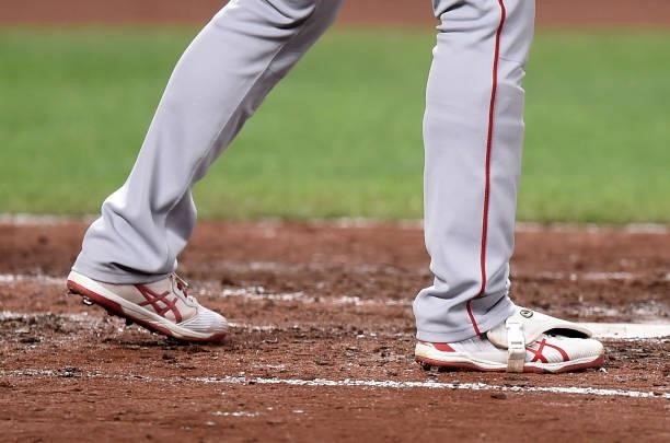 Shohei Ohtani of the Los Angeles Angels wears Asics shoes during the game against the Baltimore Orioles at Oriole Park at Camden Yards on August 24,...