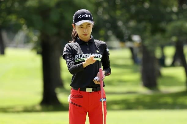 Yuka Yasuda of Japan lines up a putt on the 14th green during the first round of the Nitori Ladies at Otaru Country Club on August 26, 2021 in Otaru,...