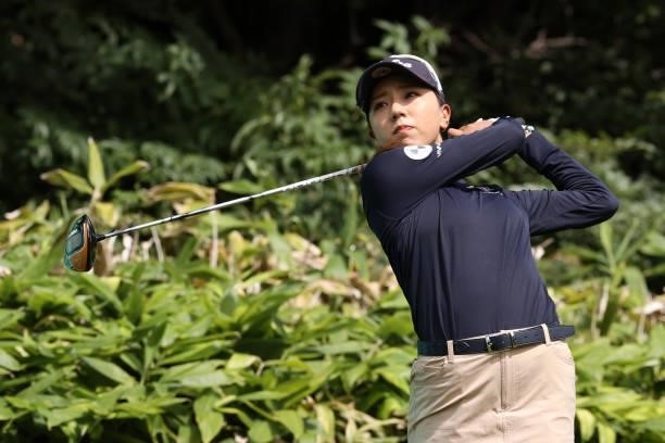 Naruha Miyata of Japan hits her tee shot on the 15th hole during the first round of the Nitori Ladies at Otaru Country Club on August 26, 2021 in...