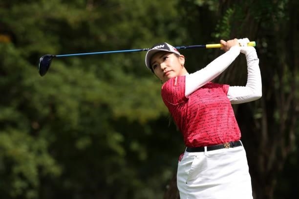 Ayano Yasuda of Japan hits her tee shot on the 13th hole during the first round of the Nitori Ladies at Otaru Country Club on August 26, 2021 in...