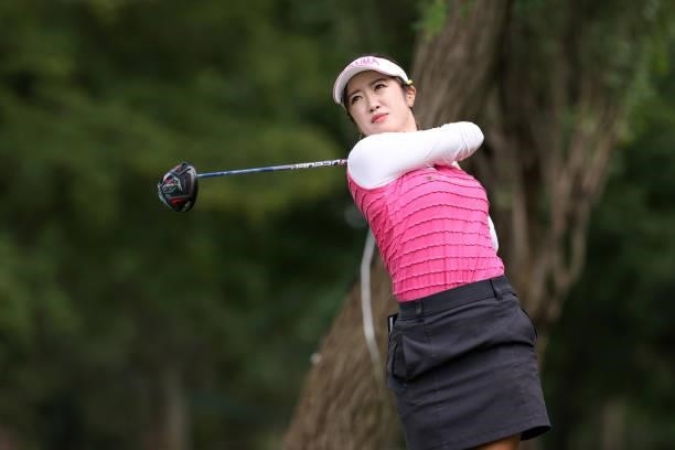 Nanoko Hayashi of Japan hits her tee shot on the 13th hole during the first round of the Nitori Ladies at Otaru Country Club on August 26, 2021 in...