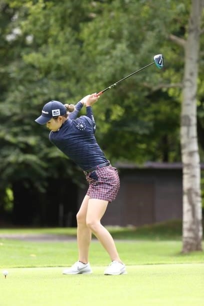 Akira Yamaji of Japan hits her tee shot on the 2nd hole during the first round of the Nitori Ladies at Otaru Country Club on August 26, 2021 in...