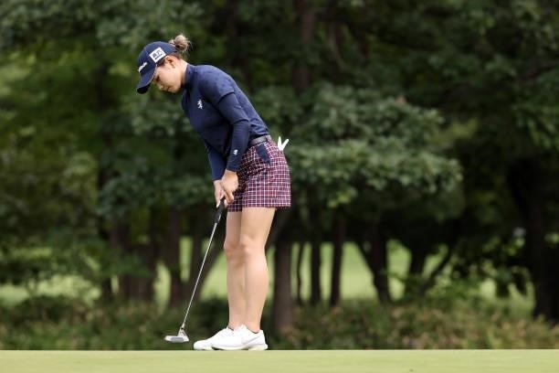 Akira Yamaji of Japan holes the birdie putt on the 2nd green during the first round of the Nitori Ladies at Otaru Country Club on August 26, 2021 in...