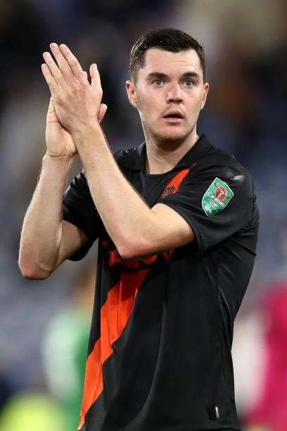 Michael Keane of Everton applauds the fans following victory in the Carabao Cup Second Round match between Huddersfield Town and Everton at The John...