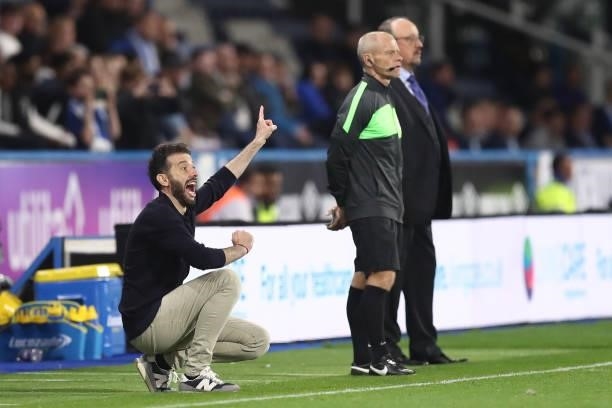 Carlos Corberan, Manager of Huddersfield Town gives instructions during the Carabao Cup Second Round match between Huddersfield Town and Everton at...