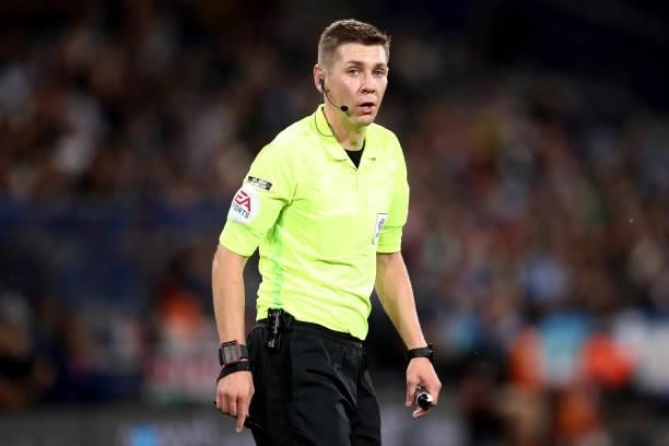 Match Referee, Matt Donohue looks on during the Carabao Cup Second Round match between Huddersfield Town and Everton at The John Smith's Stadium on...