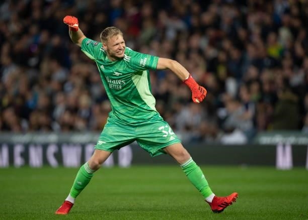 Goalkeeper Aaron Ramsdale celebrates Arsenal's first goal during the Carabao Cup Second Round match between West Bromwich Albion and Arsenal at The...