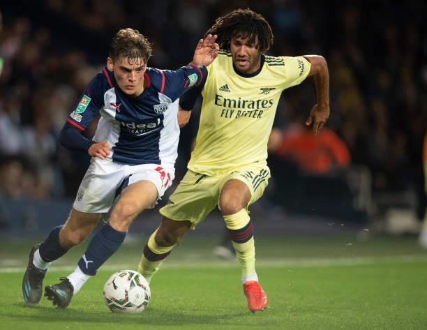 Tom Fellows of West Bromwich Albion and Mohamed Elneny of Arsenal during the Carabao Cup Second Round match between West Bromwich Albion and Arsenal...