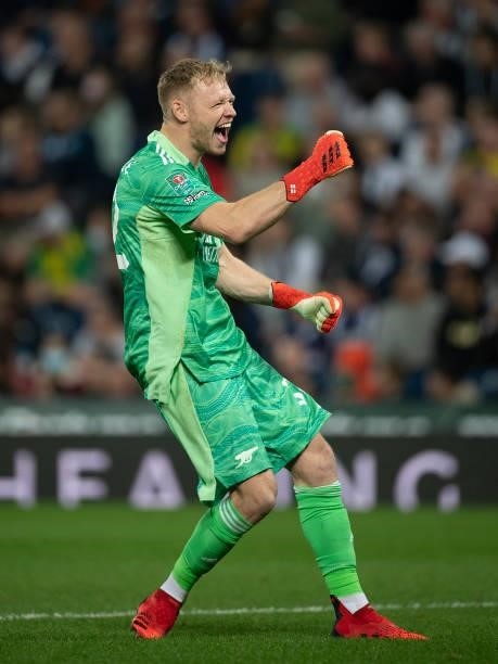Goalkeeper Aaron Ramsdale celebrates Arsenal's third goal during the Carabao Cup Second Round match between West Bromwich Albion and Arsenal at The...