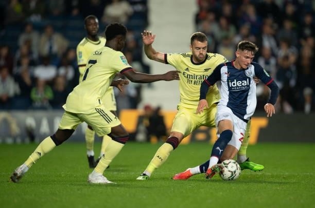 Taylor Gardner-Hickman of West Bromwich Albion and Calum Chambers of Arsenal during the Carabao Cup Second Round match between West Bromwich Albion...