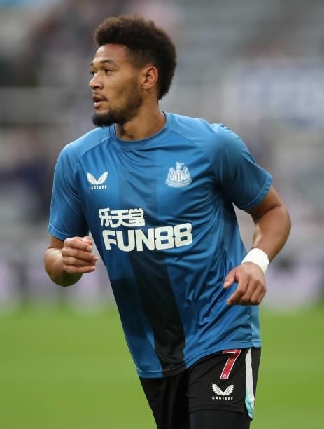 Joelinton of Newcastle United warms up during the Carabao Cup Second Round match between Newcastle United and Burnley at St. James Park on August 25,...