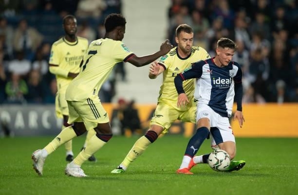 Taylor Gardner-Hickman of West Bromwich Albion and Calum Chambers of Arsenal during the Carabao Cup Second Round match between West Bromwich Albion...